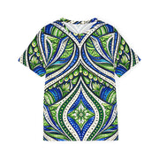 Model shown in side profile, wearing a t-shirt featuring an all over green white and blue Ankara style leaf pattern