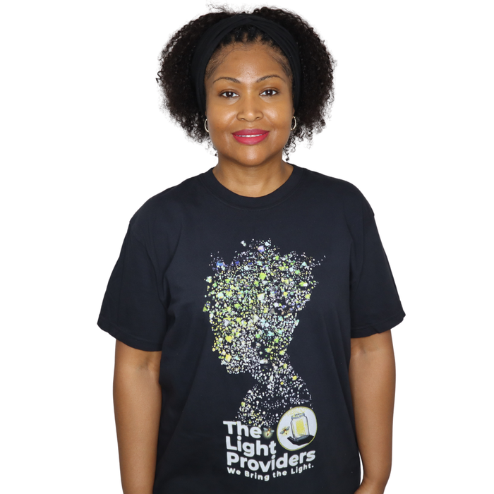 Woman wearing a black t-shirt with a graphic design and text on a white background
