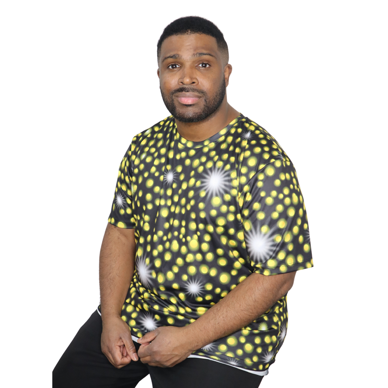 Model shown in a detail view of the print, wearing a sports jersey featuring an all over scattered light and firefly glow ...