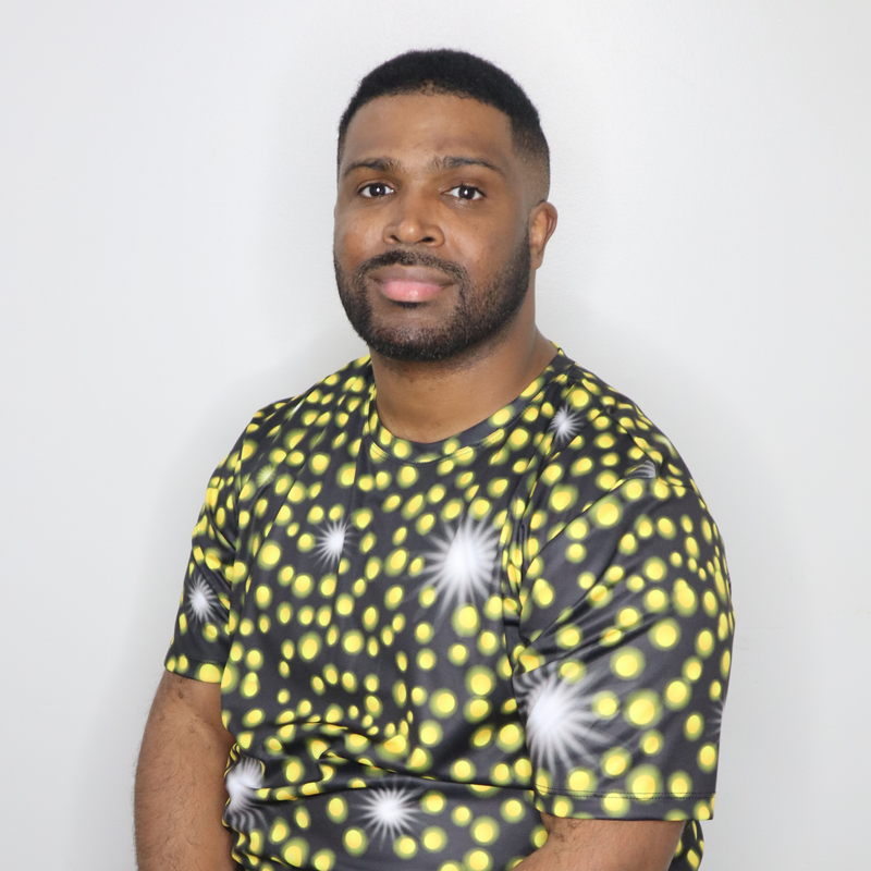 Model shown looking to the side, wearing a sports jersey featuring an all over scattered light and firefly glow pattern in...