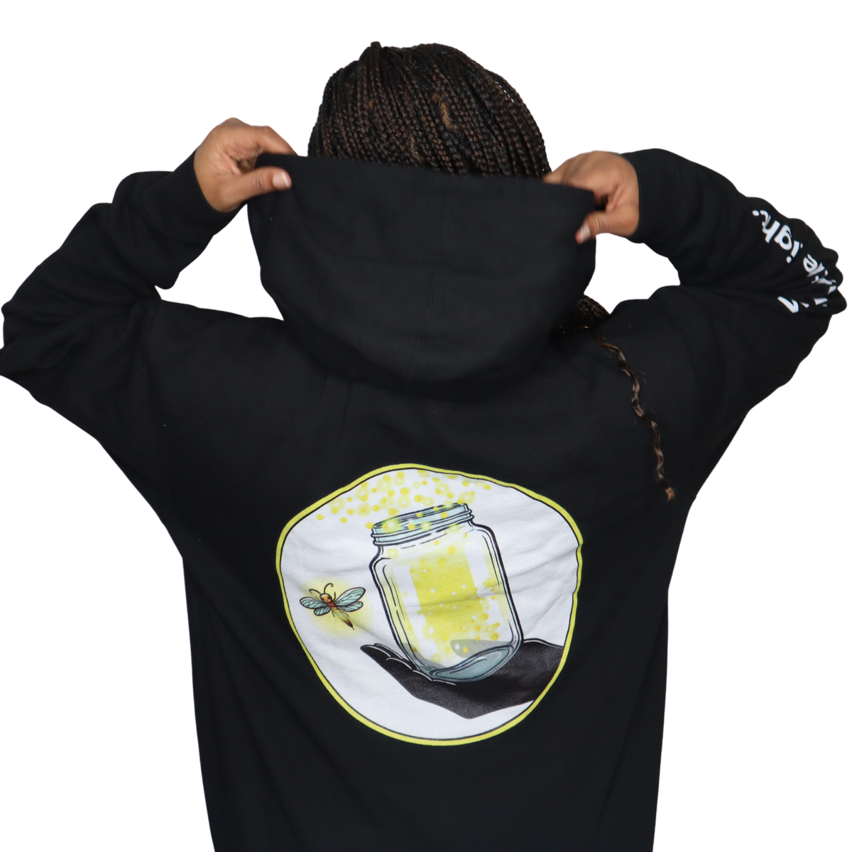 Model shown with arms crossed, wearing a black zip hoodie featuring The Light Providers logo patch on the chest and We Bri...