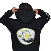 Model shown with arms crossed, wearing a black zip hoodie featuring The Light Providers logo patch on the chest and We Bri...