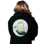 Model shown from the front, wearing a black zip hoodie featuring The Light Providers logo patch on the chest and We Bring ...