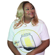 Model shown from the front, wearing a garment dyed t-shirt featuring The Light Providers logo and firefly jar graphic in w...