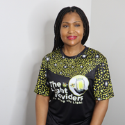 Model shown in a detail view of the print, wearing a sports jersey featuring a scattered firefly light pattern with The Li...