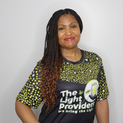Model shown looking to the side, wearing a sports jersey featuring a scattered firefly light pattern with The Light Provid...
