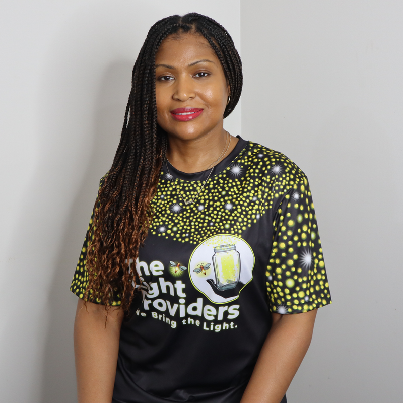 Model shown in a detail view of the print, wearing a sports jersey featuring a scattered firefly light pattern with The Li...
