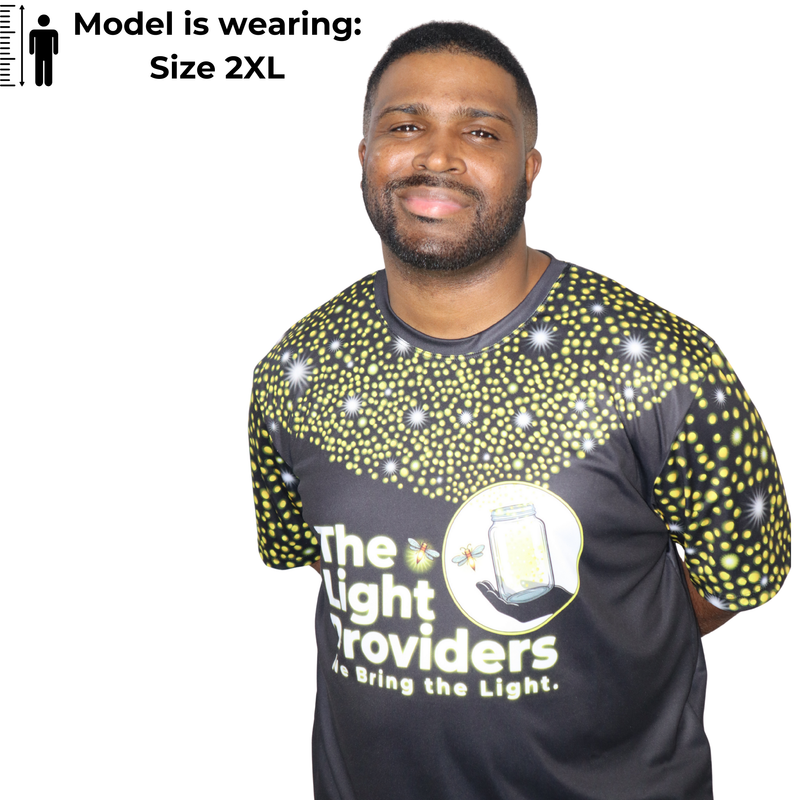 Model shown from the front, wearing a sports jersey featuring a scattered firefly light pattern with The Light Providers l...