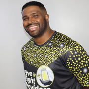 sports jersey shown flat, front view featuring a scattered firefly light pattern with The Light Providers logo and firefly...