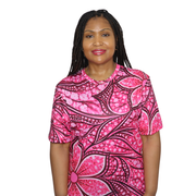 Person wearing a sports jersey featuring an all over pink Ankara style floral pattern