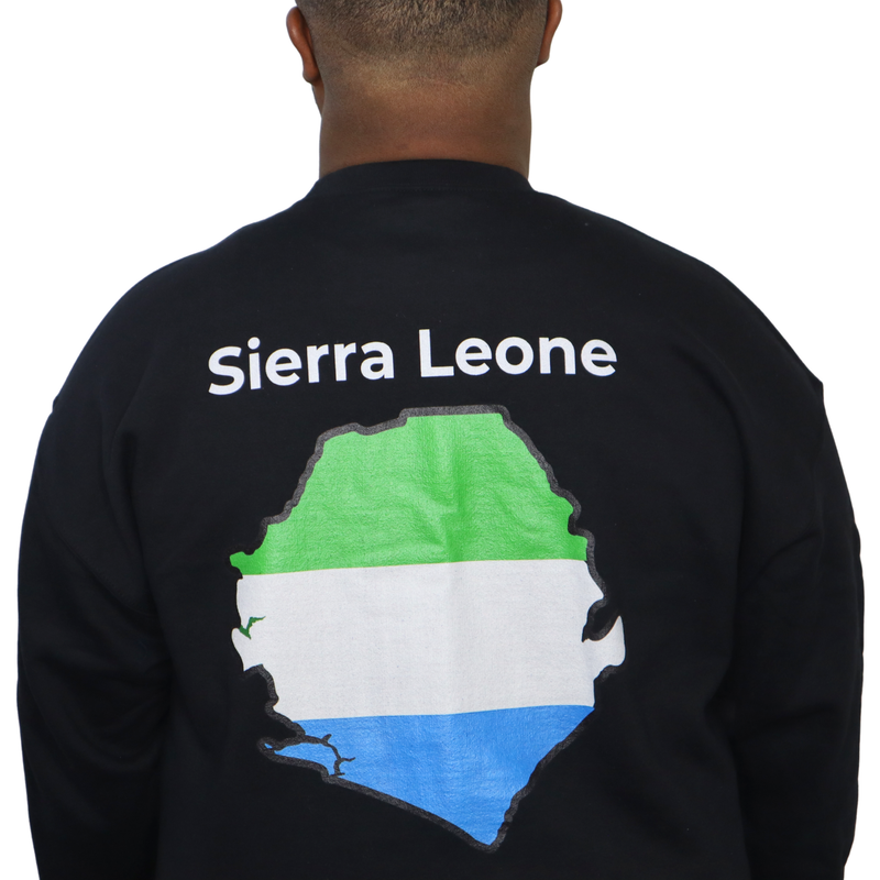 Model shown with hand on hip, wearing a black crewneck sweatshirt featuring a Sierra Leone text and country outline map pr...