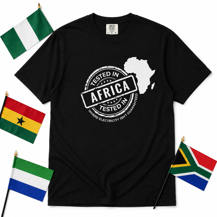 Tested In Africa stamp design with a white Africa map silhouette on a black t-shirt, styled product photo