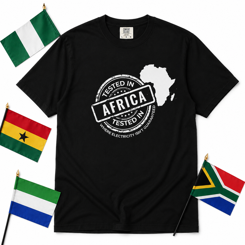 Tested In Africa stamp design with a white Africa map silhouette on a black t-shirt, styled product photo