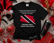 Trinidad Carnival quote design with a red white and black Trinidad and Tobago flag brushstroke graphic on a black t-shirt,...
