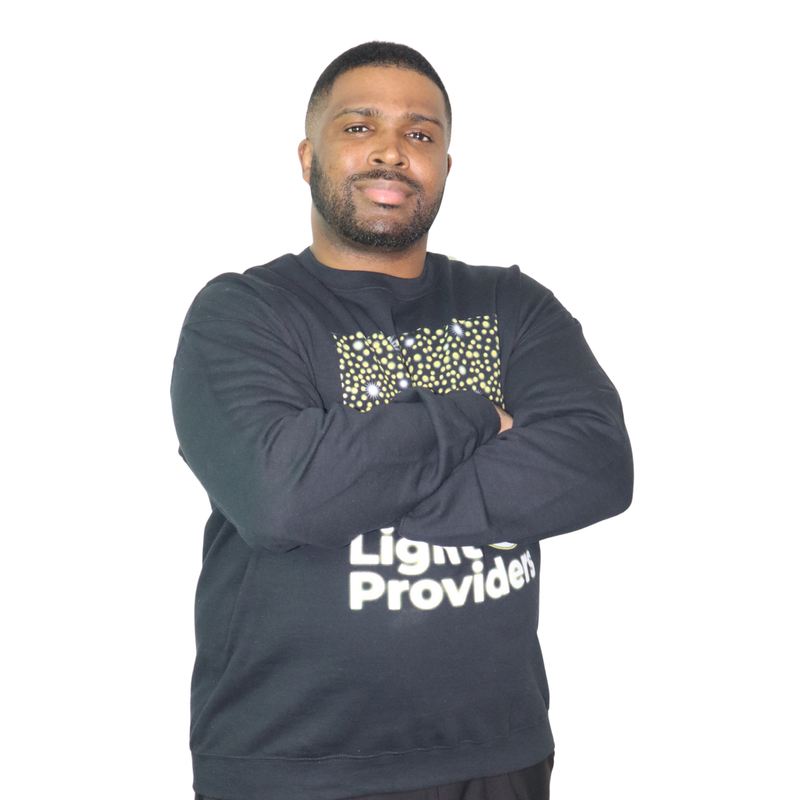 Man wearing a black sweatshirt with text and graphics on a white background