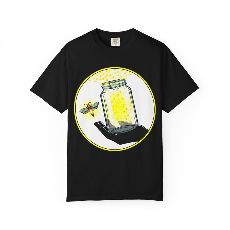 Model shown from a three quarter angle, wearing a garment dyed t-shirt featuring The Light Providers logo and firefly jar ...