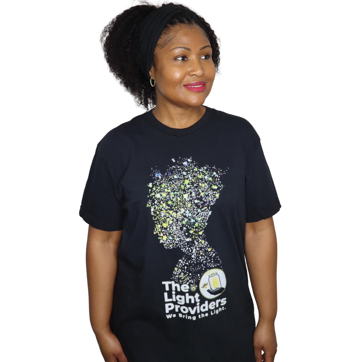 Woman wearing a black t-shirt with a graphic design and The Light Providers logo on front