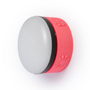 Pink flower wall mount with wireless light on a white background