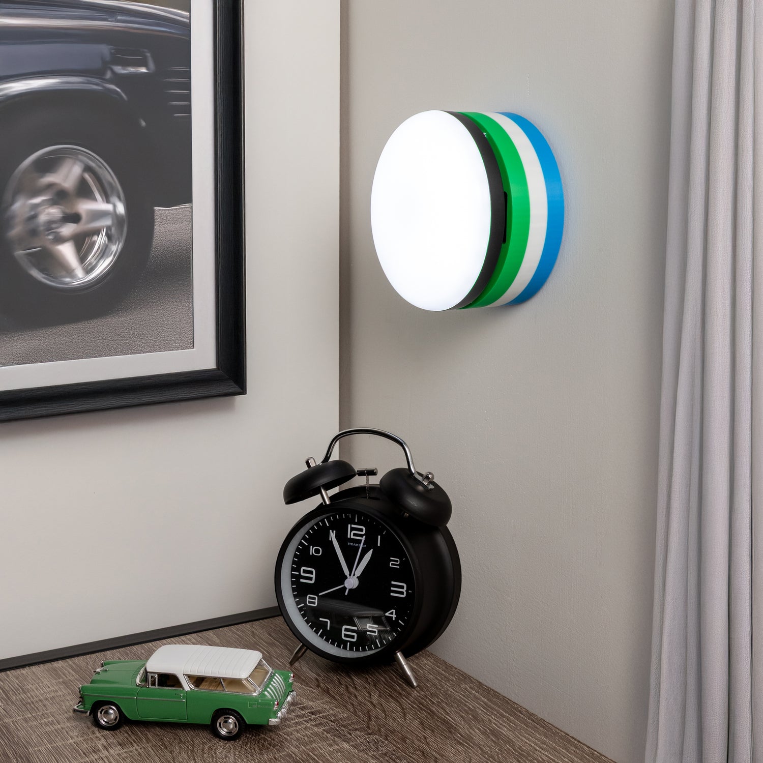 Green, White & Blue Pattern wall mount showcased on a wall by a desk