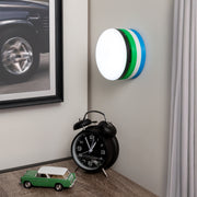 Green, White & Blue Pattern wall mount showcased on a wall by a desk