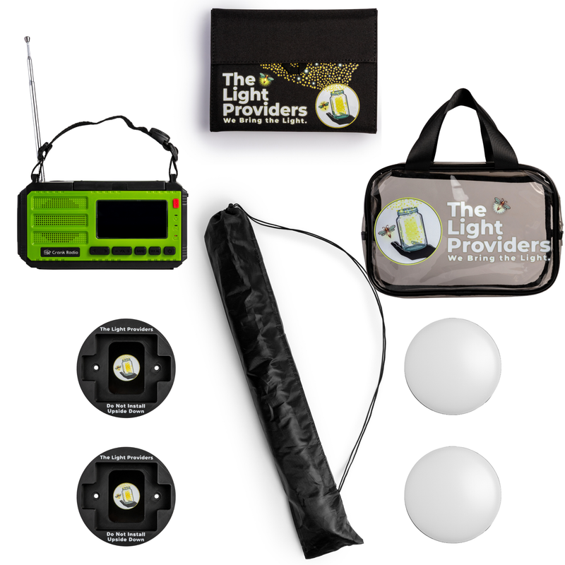 Starter bundle include two wireless lights, two black mounts, tripod, clear utility bag, solar panel, emergency radio on a white background